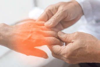 Dr. Rob Neuenschwander describing chiropractic care for peripheral neuropathy at Neu Life Chiropractic in Tomball, TX