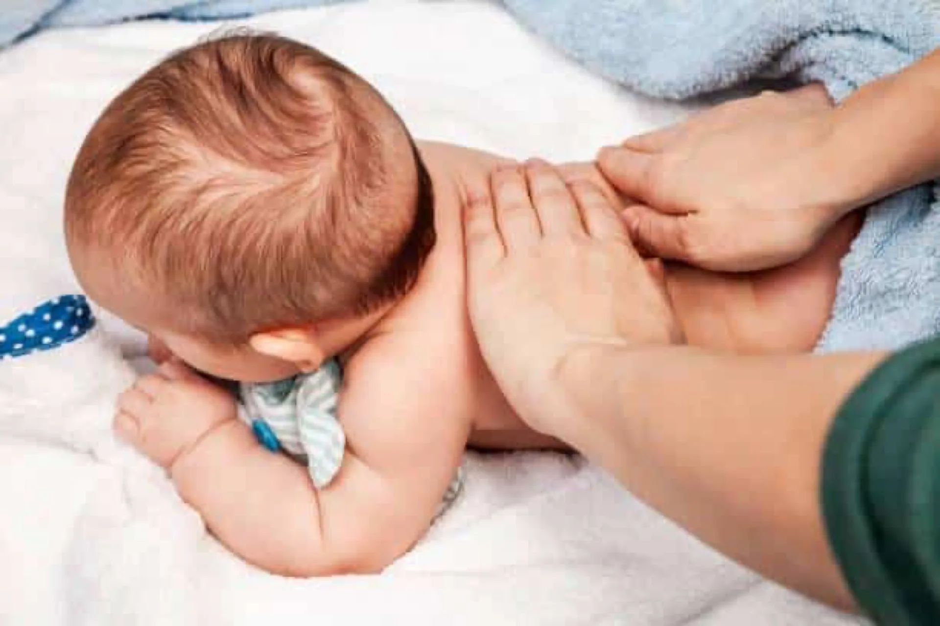 Pediatric chiropractic adjustment at Neu Life Chiropractic in Tomball, TX